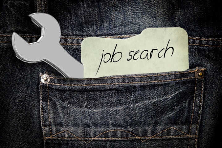 Person wearing a jean with the word job search